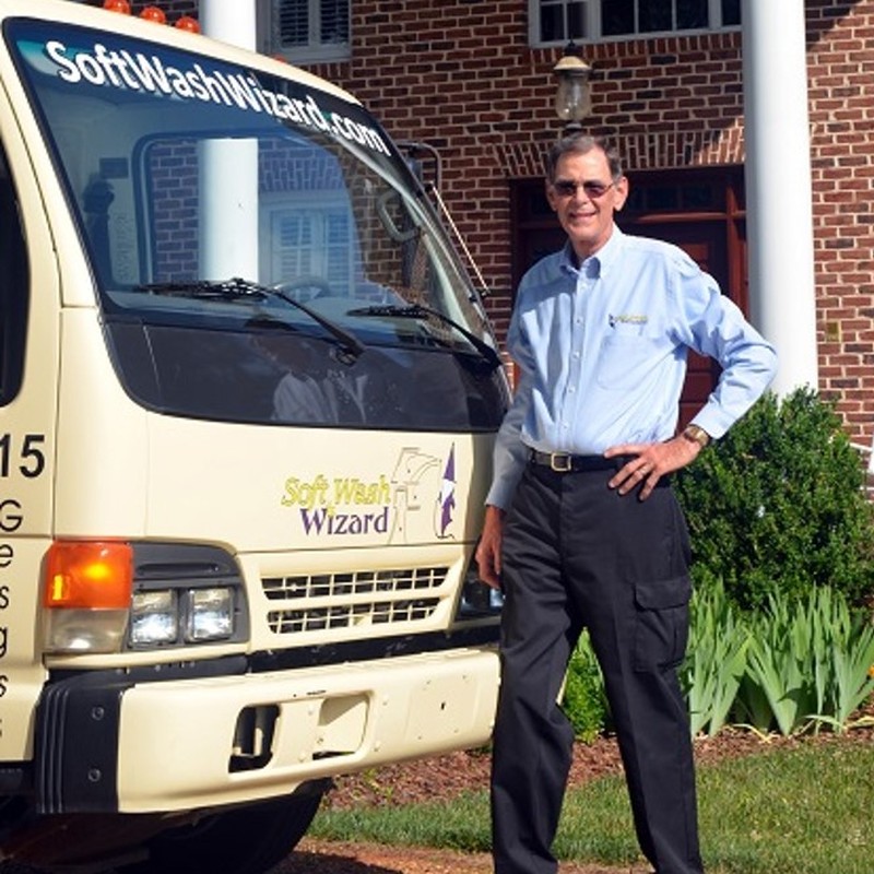Steve Babcock Owner of Soft Wash Wizard stands by his vehicle